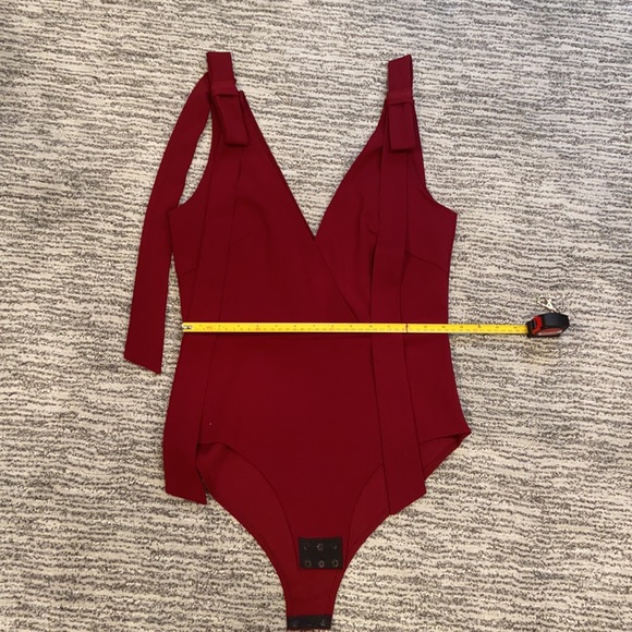 NWT “Oh My Love “ burgundy sleeveless bodysuit with bow accent. Size Med… - Picture 5 of 8